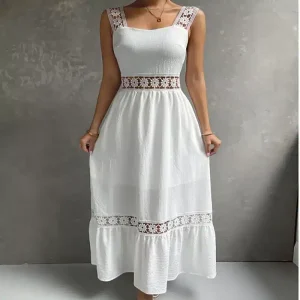 Robe bohème en dentelle blanche ajourée